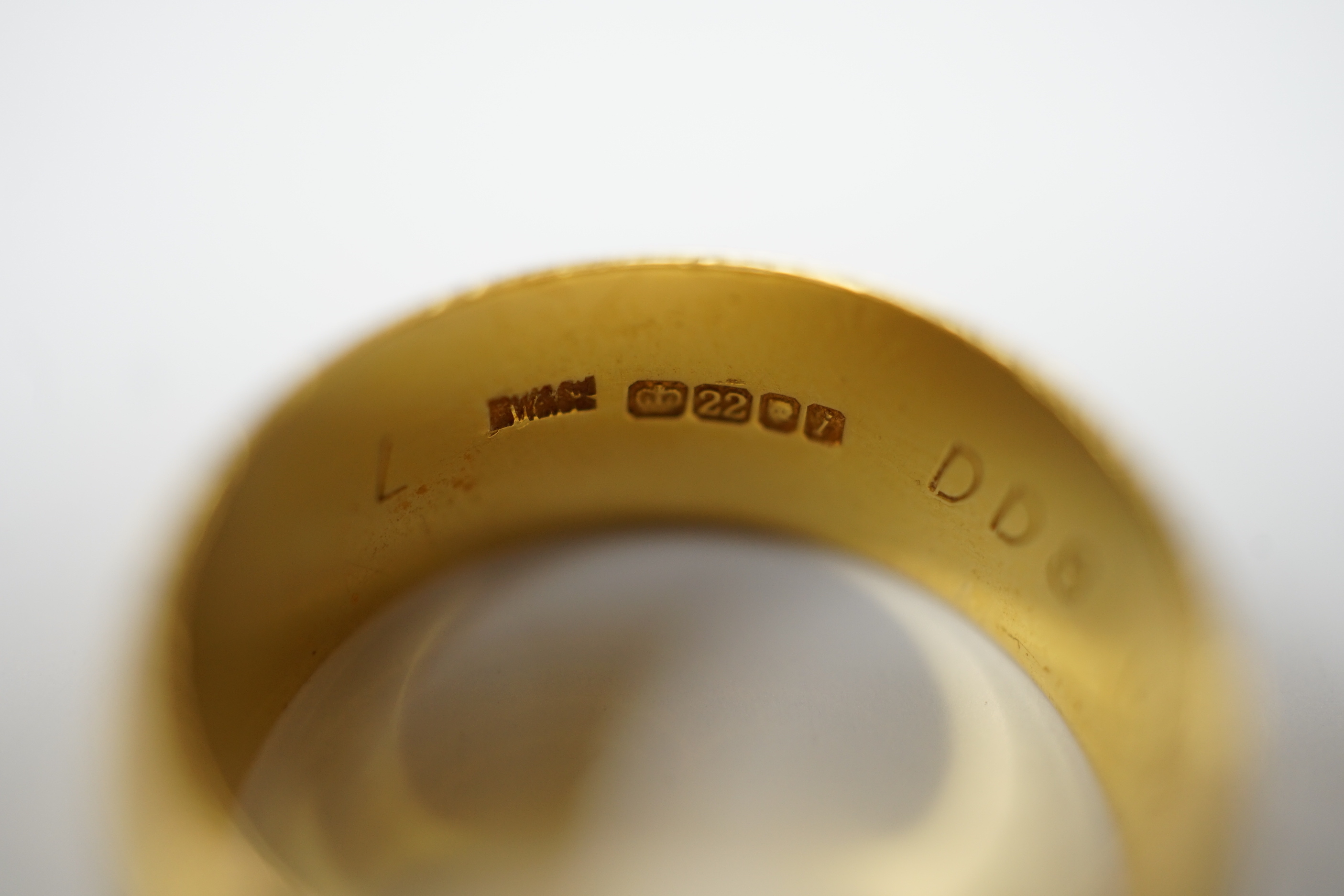A 1960's 22ct gold wedding band, size L, 7.5 grams.